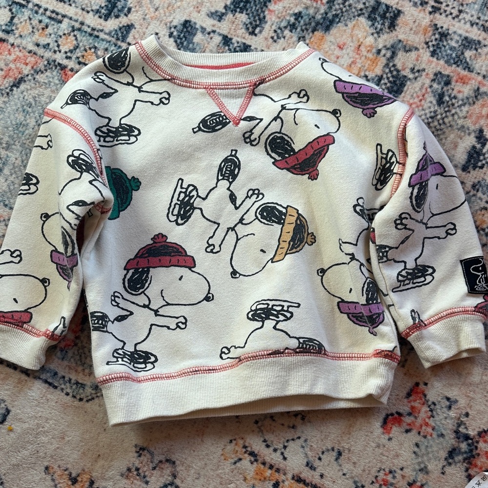 Peanuts Snoopy Kids Sweatshirt - Cream with Colorful Skating Design